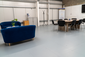 Training facility at Prism Medical Scotland. The photo shows a table and chairs.